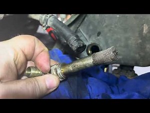 2003 Polaris Sportsman 400 Oil and Filter Change along with oil screen inspection.