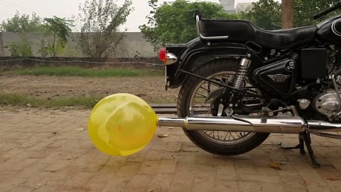 Balloon Explodes on Motorcycle Exhaust Pipe