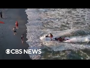 Crews on jet skis rescue swimmers in distress off New Jersey coast