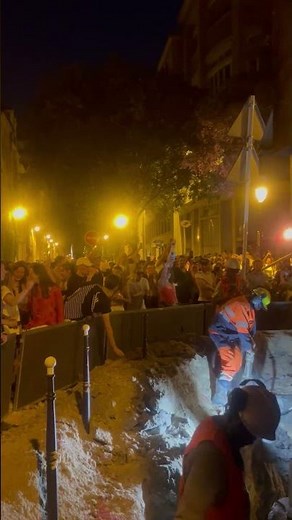 Crowd Cheers On Construction Workers During Fête de la Musique Celebration