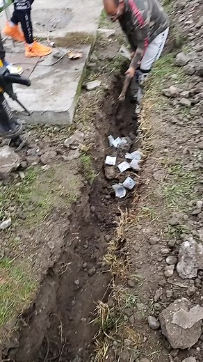 Manual Labor: Digging a Trench Outdoors