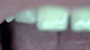 Spooky macro of an eye and mouth sequence, stop motion