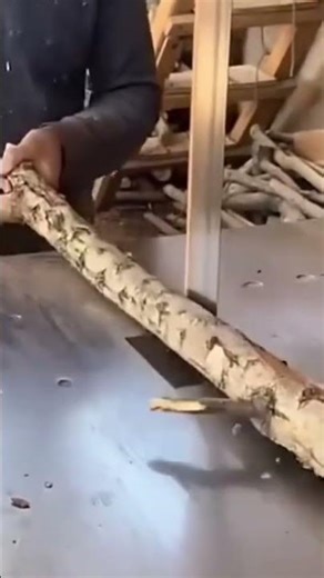 This is a log that is being cut using a sharp cutting tool