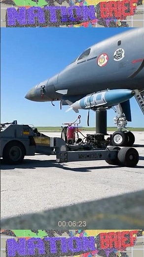 U.S. Airmen load anti-bunker GBU-72 onto B-1B Lancer Supersonic Bomber