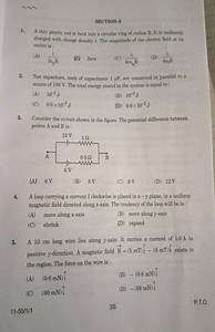 SECTION AA thin plastic rod is bent into a circular ring of ra... | Filo