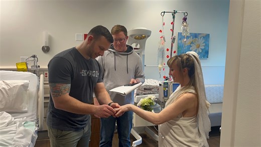 Couple marries at hospital hours before welcoming newborn