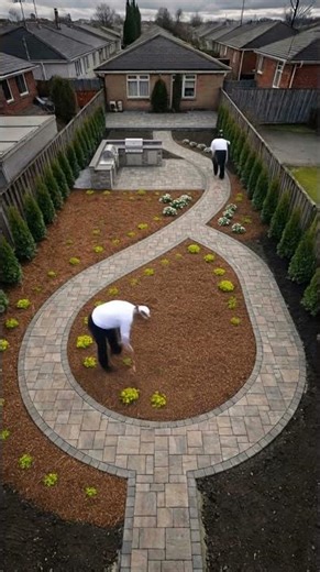 From bare dirt to a luxury backyard makeover. Curved paver walkway, custom BBQ zone.