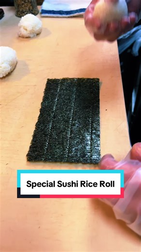 How to make sushi rice roll. Making the special sushi rice roll! Would you rate this a 10/10? #sushi #fyp #howto #pov #usa