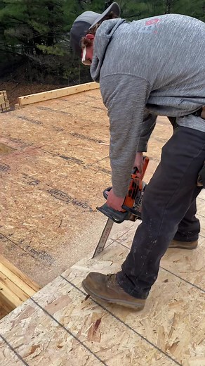 Efficient Window and Door Cutting with Chainsaw by Professional Framers