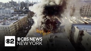 Massive fire in Manhattan forces residents out into cold