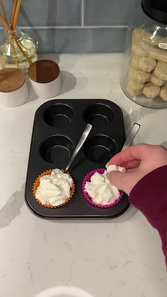 Whipped cream hot chocolate bombs with marshmallows & sprinkles
