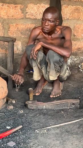 The blacksmiths of Ouidah, in Benin, occupy a sacred place within the Vodou tradition, especially associated with the deity Gu (Ogun), god of iron, war, and technology. Their work goes beyond mere craftsmanship: they forge agricultural tools, ritual weapons, and sacred objects used in ceremonies. The blacksmith's workshop is considered a spiritual space where fire and metal represent Gu's creative power. These artisans are respected as mediators between the human and the divine, guardians of the