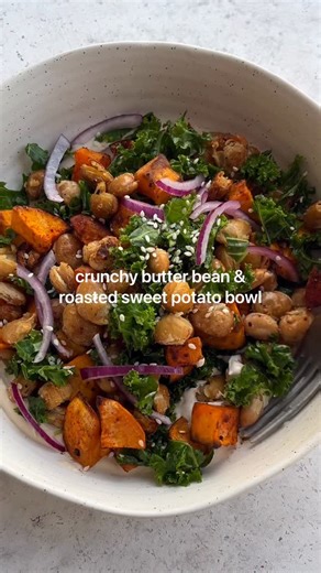 Easy nourish bowl👇🏼🌿 Crunchy butter beans, roasted sweet potato, red onion and kale on a bed of creamy tahini! If you dislike kale, try this method of massaging it with lemon/oil to make it more tender and easier to digest. If you haven’t checked out my previous nourish bowl recipes, save this video for later and go watch! Don’t forget to follow @tessbegg for more recipes. Serves 2 Beans: 2 cups of canned butter beans, drained and rinsed Drizzle of olive oil 1 tsp garlic powder Pinch of salt 