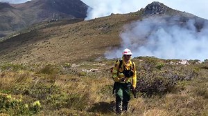 Hot, hard and dirty work. Remote area firefighters at work today atop Mount Wright in Tasmania’s southwest. The RATs work in tandem with waterbombing helicopters, extinguishing the remnants with hand tools after the water drop. #southwest | Tasmania Fire Service