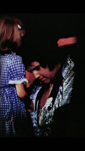 #elvispresley And The Little Blind Girl. On July 20th 1975, Elvis Presley was in the middle of a concert, and in between songs he started handing out scarves and joking and talking to the audience, when to the left of the stage he saw a little girl just standing there. Elvis walked over to her and knelt down in front of her, when he quickly realized that she was blind. He put down his microphone, and spoke to her, but the audience couldn't hear what he was saying. He talked to her for quite a lo