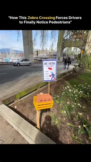 Wealth on Instagram: "At first it looks strange - a brick placed at the start of a zebra crossing. But it's actually a smart safety design meant to change driver behavior. These crossings are called "Be Seen" pedestrian crossings. The brick isn't real. It's a lightweight foam or plastic block that pedestrians pick up while crossing the road. From a driver's perspective, it looks like a solid brick, triggering an instant psychological response: slow down and stop. The idea is simple - drivers rea