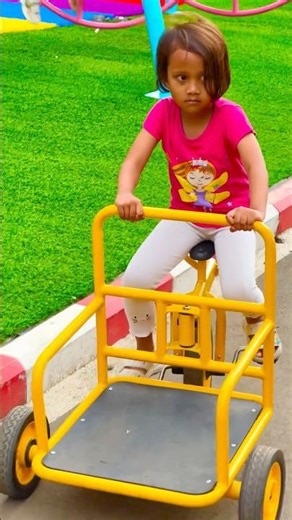 😂👧 Little girl pretending to be a rickshaw driver, pure fun and playful vibes! #shorts