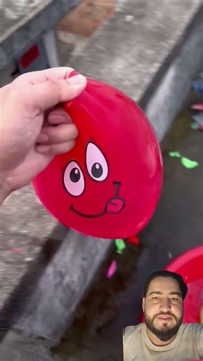 Experiment: Will a water balloon explode when it rolls down from a tall building?#satisfying