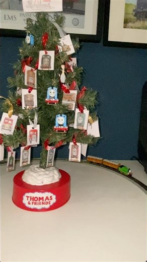 Bachmann N scale Percy running around the Christmas tree with Annie and Clarabel