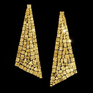 2.8K views · 470 reactions | Introducing our statement earrings - brought to life with exquisitely effervescent yellow diamonds. These larger than life treasures feature 81.68 carats of yellow diamonds, set within a contemporary and sculptural silhouette that seductively skims the shoulder. | Graff | Facebook