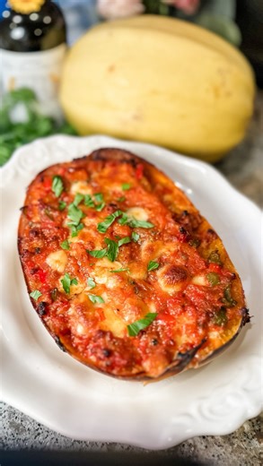 Dena Fenza -🇮🇹🇺🇸Mamma🧿 on Instagram: "Sausage and Peppers Stuffed Spaghetti Squash is an easy low carb meal that is so delicious you will love it. Here is a tip to make the squash easier to cut. Prick it all over with a fork. Bake for 10 to 12 minutes in the oven at 400 degrees. Remove from the oven, let it cool, then cut. You can also do this in the microwave (but I don’t like using them). Prick the squash and then put in the microwave for about 1 to 2 minutes until it becomes easy to cut.
