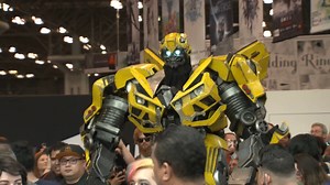 Check out this towering Bumble Bee Cosplay and a side kick to boot! | IGN
