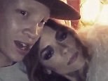 Jaime King snuggles up to model Shaun Ross for a selfie video