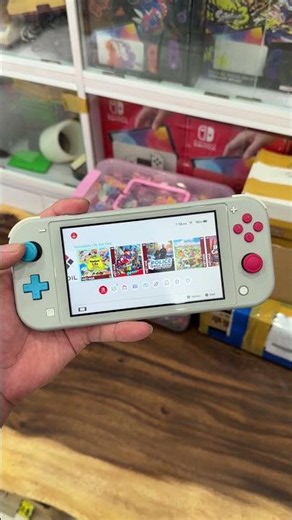 Trên tay Nintendo Switch Lite hack cài game chơi hết hè 2026
