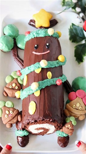 Gloria on Instagram: "This year's yule log seems a bit sus... 🤔🪵🎄 I was already planning to make a Sudowoodo yule log cake this year (but with string lights like the cake pop version I made in 2021), so when I saw this year's costume Sudowoodo in @pokemongoapp I knew I had to match that design! Watch to the end to see some festive lil Bonsly cookies I made to keep Sudowoodo company 🥹 Happy holidays everyone! Recipes: @preppykitchen 's yule log recipe for the cake with @sallysbakeblog 's yule