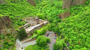 Armenian monastery of Geghard. facade of Geghard Monastery and church carved into rock in Armenia is an important place of tourist and religious pilgrimage. UNESCO World Heritage Site Gokht, Armenia