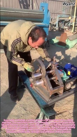 metalworking process | worker rolls flat iron sheet into cylinder