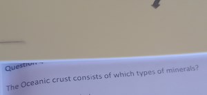 The Oceanic crust consists of which types of minerals?... | Filo
