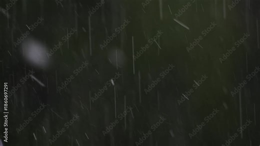 Slow-motion footage of a massive hail storm with large ice pellets violently striking the ground, capturing extreme weather intensity, icy textures, and atmospheric chaos under dark, stormy skies.