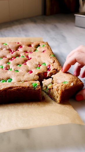 Hands down the best M&M Cookie Bars of your life ❤️ https://whatsgabycooking.com/mm-cookie-bars/ | What's Gaby Cooking