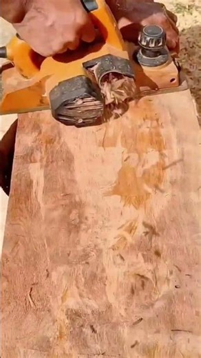 Smoothing Rough Wooden Board Surface Using Powerful Electric Planer Tool