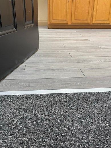 Wood-look tile installed in a 1/3 staggered pattern for a modern and natural feel. Durable, stylish, and professionally finished. | AG Quality Flooring LLC