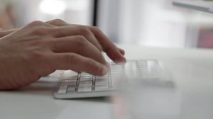 Typing quickly on an Apple keyboard - Free Stock Video Footage | Coverr