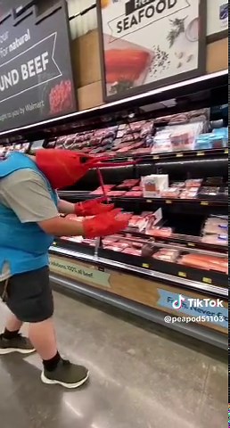 Exploring Ground Beef Aisle in Unique Lobster Costume