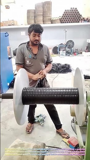 Satisfying Factory Work: Watch a Worker Skillfully Wind Electrical Cable onto a Large Spool! 🏭⚡↓
