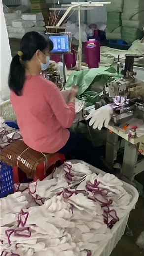 Automated Glove Overlock Stitching: High-Speed Wrist Hemming Process