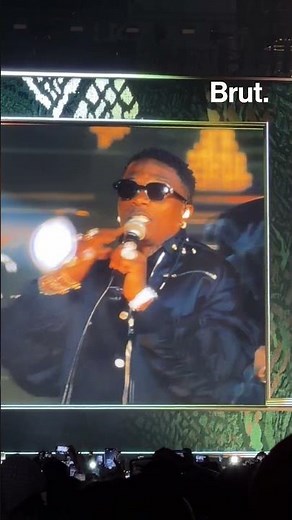 Fally Ipupa and Wizkid perform their new song at Stade de France.