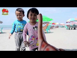 Children's Toys - Finding Dinosaur toys in the Sand - Dinosaurs for Kids