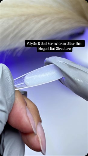 Angela A. | Femme Nail Academy™ | Double Licensed EU & US on Instagram: "PolyGel & Dual Forms for an Ultra-Thin, Elegant Nail Structure After prep, I used Dual Forms with PolyGel to build the structure and extend the length, controlling the product with my fingers and alcohol (or slip solution) I gently pressed and stretched the PolyGel inside the form and underneath, placing it exactly where it’s needed to avoid bulk and create a thin, precise architecture. With correct placement, this techniqu