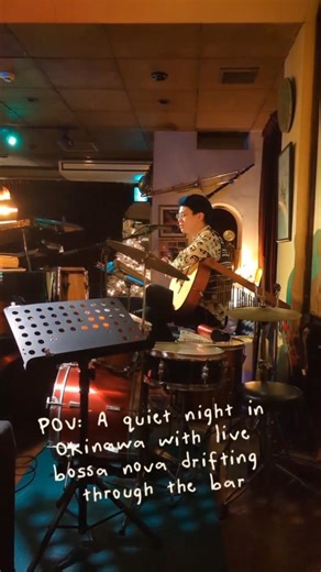 POV: A quiet night in Okinawa with live bossa nova drifting through the bar