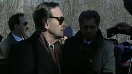 Prime Minister Jean Chrétien extends a 'Shawinigan handshake' in 1996