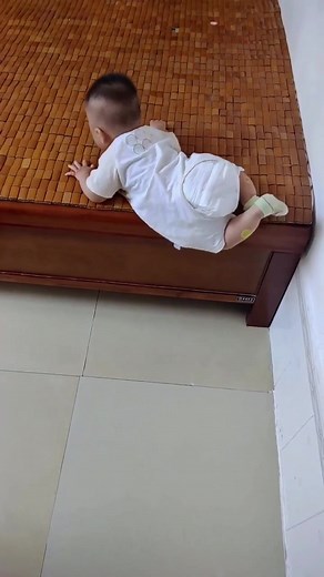 Baby's Adorable Climb Out Of The Crib
