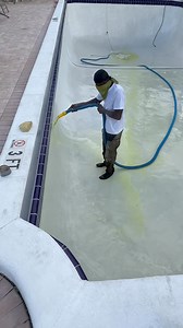 Acid wash to expose the blue aggregate | Agape Pool Finishing