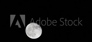 Moon Timelapse, Stock time lapse : Full moon rise in dark nature sky, night time. Full moon disk time lapse with moon light up in night dark black sky. High-quality free video footage or timelapse