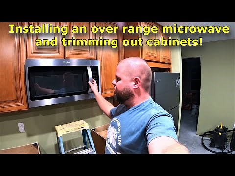 Installing an over range microwave and trimming out the kitchen cabinets! #510