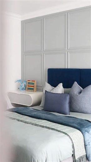 Didi Khumalo on Instagram: "My 5 Year Olds Bedroom💙 Bed headboard and base: @trenerydesignerfurniture Side pedestals/table, wallpaper, floating shelfs: @trenerydesignerfurniture Cupboard wrapping: @thekitchenwrapco Bedding, throws, chair, baskets: @mrp_home Curtains: @thecurtaincabin_sa Rug: @rugsoriginal"